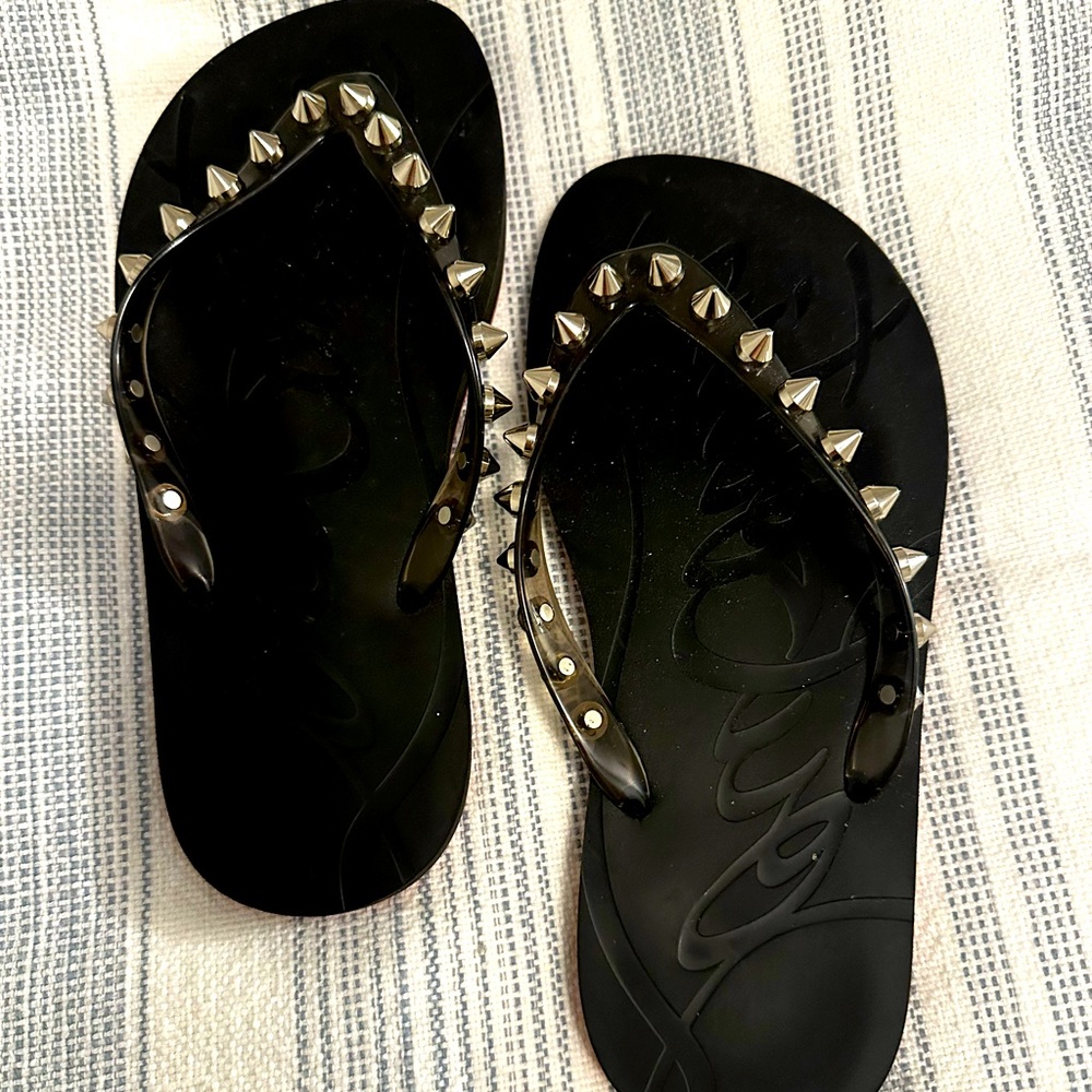 Authentic Christian Louboutin Flip Flops.
